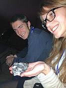 Students examine a meteorite at SpaceVision 2012.