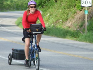 Jayme Haynes biking in Central Bridge on her cross country adventure