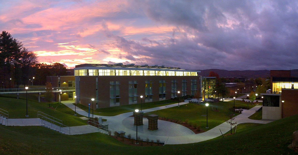 SUNY Oneonta campus building at twilight