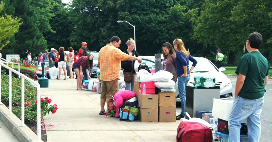 Students and parents at move-in day at SUNY Oswego.