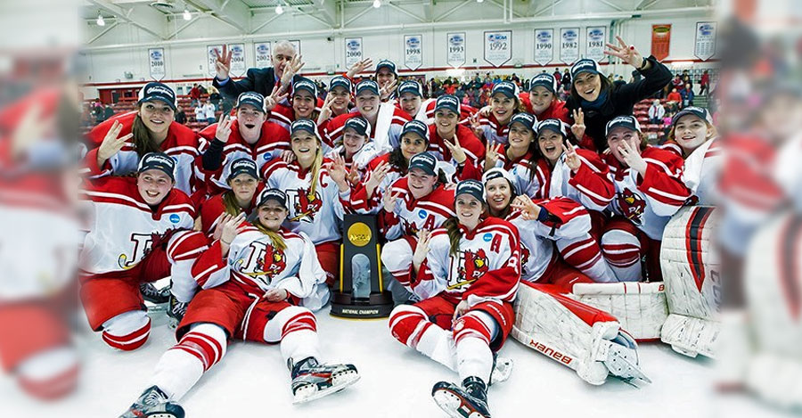 SUNY Plattsburgh women's hockey team celebrates winning the NCAA DIvision III title in 2016.