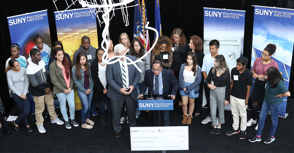 Elementary school students at SUNY Poly's CNSE in Albany receive Be the Change for Kids Awards with the New York State School Boards Association.