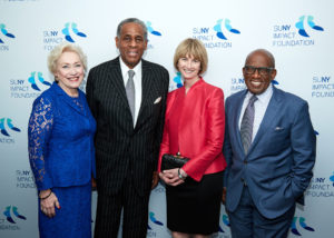 Chancellor Zimpher, Carl McCall, Kristina M Johnson, and Al Roker pose for the camera at the EOP 50th Anniversary Benefit dinner.