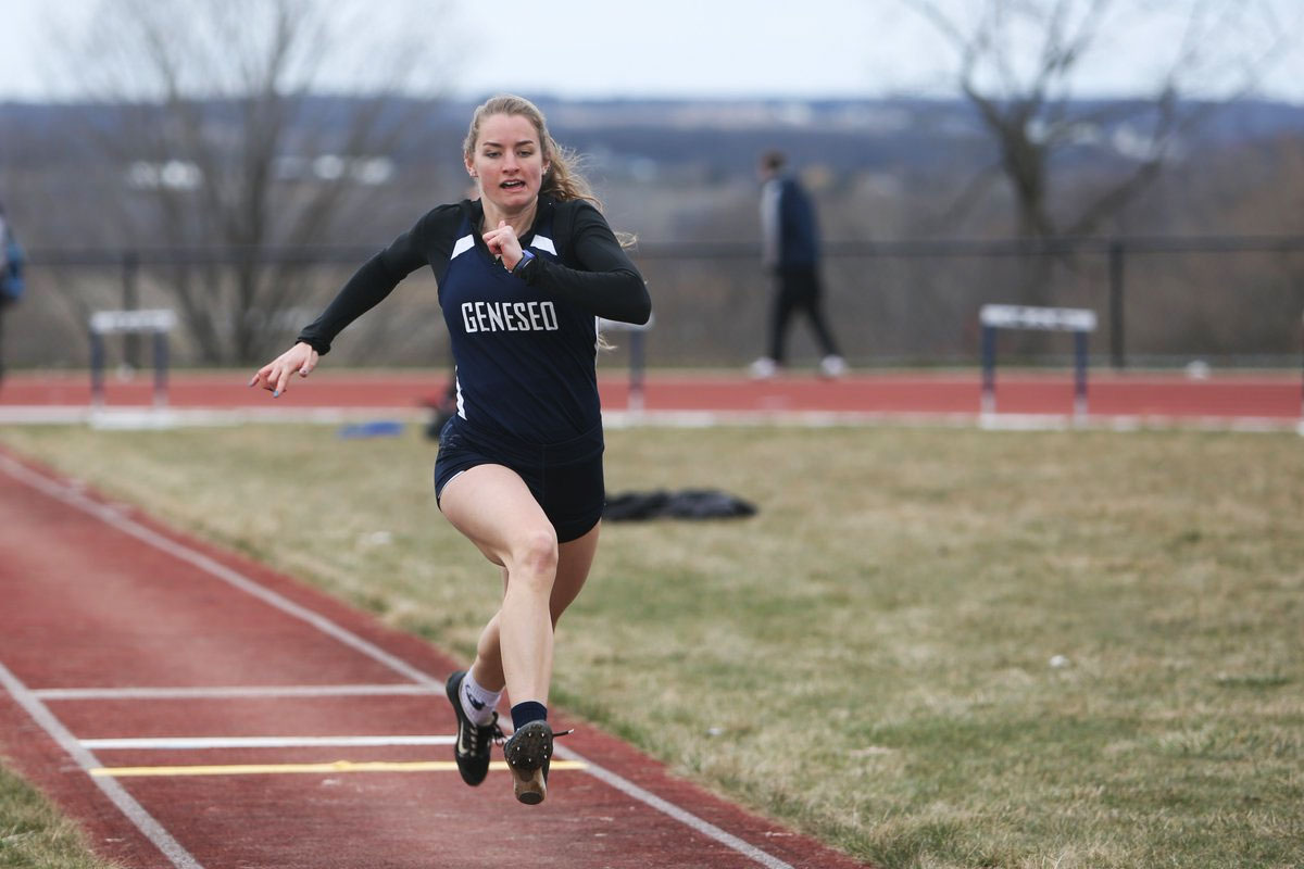 Camille Wutz of SUNY Geneseo runs in a track and field event.
