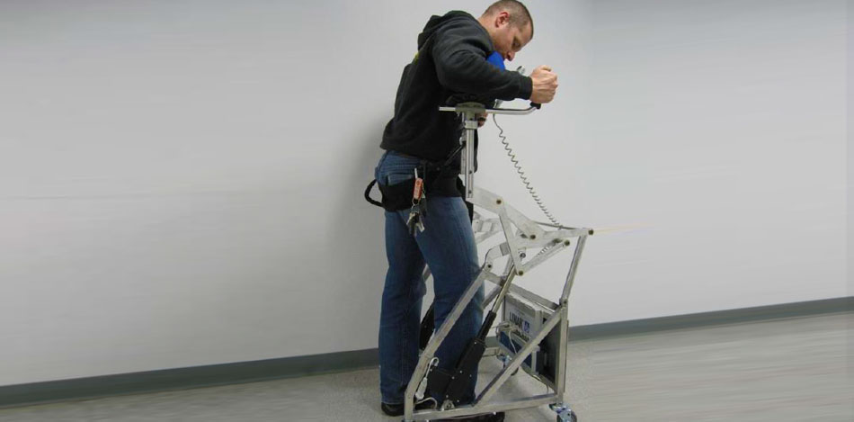 Mobility assist standing device being used.