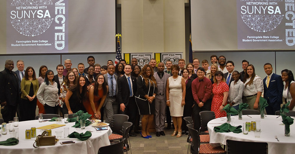 Assemblywoman Kimberly Jean Pierre poses with a large number of SUNY Student Assembly members at Farmingdale State College.