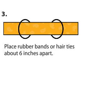 Rectangle cloth clip art with instructions to Place rubber bands or hair ties about 6 inches apart.