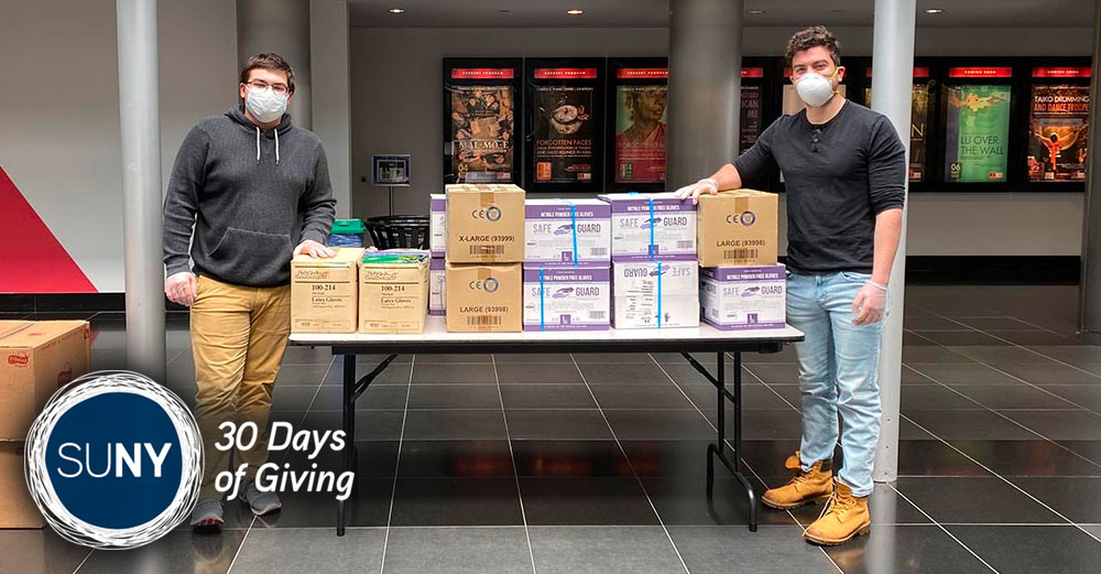 Pano Sourlis (left) and Vincent DeStefano (right) with donations from local school districts that they delivered to the Wang Center for Stony Brook University Hospital’s frontline workers