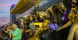 U Albany fans in bleachers at football game
