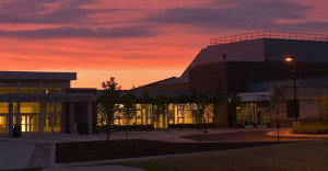 Oswego campus building during sunset
