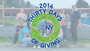 30 Days of Giving 2014 with students from oneonta doing building and cleanup.