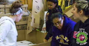 University at Albany students volunteer at the Regional Food Bank of Northeastern New York.