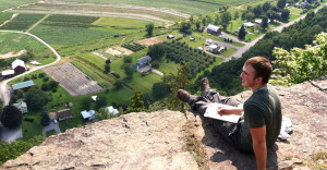 Freshman Mike Barr checks out the view from Vroman's Nose in Schoharie County on the first day of GEOFYRST, a six-day geology camping trip for new students.