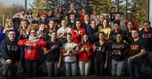Various members of Greek Life organizations pose outdoors at SUNY New Paltz.