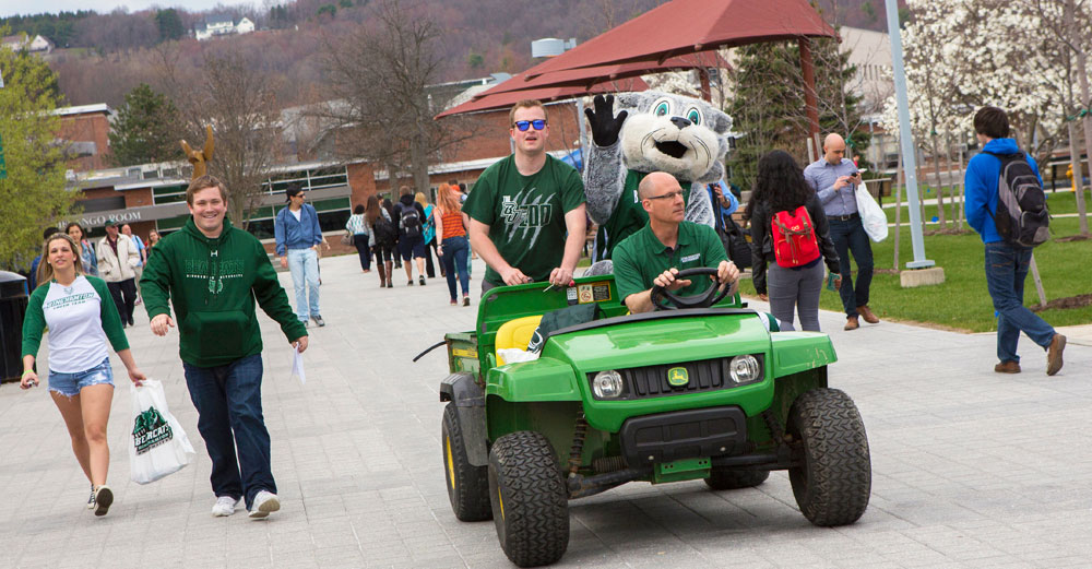 Baxter Bearcat from Binghamton University in the Mascot Madness championship parade on campus. 