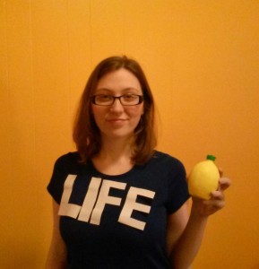 Female in tshirt with LIFE written on it. 