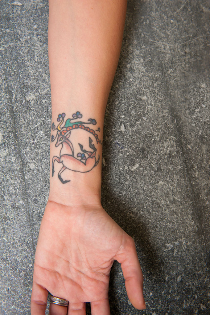 tatoo on forearm of reindeer like animal