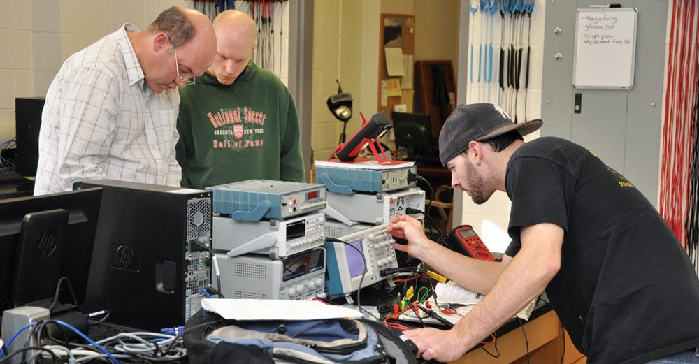 Clinton Community College students in electronics tech class.