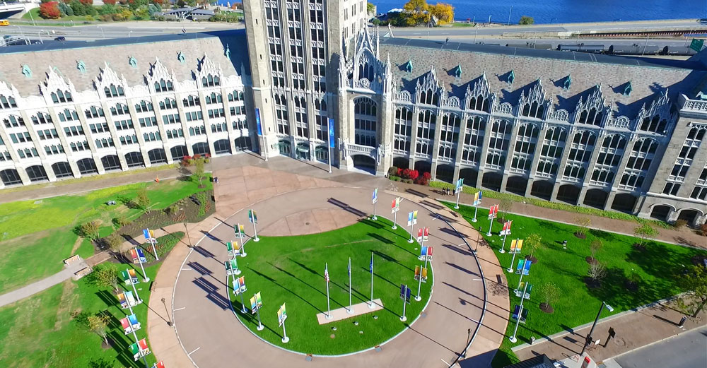 SUNY Plaza aerial with focus on circle with campus banners