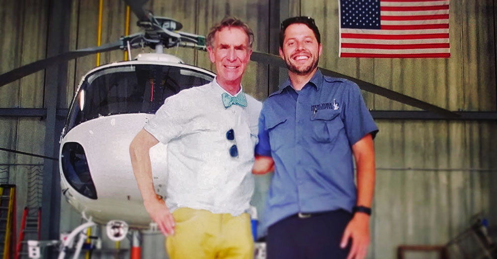 NYS Master Teacher Biran Perry stands in front of an airplane with Bill Nye