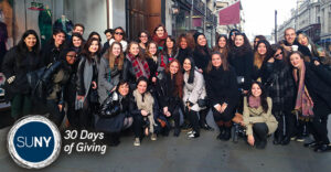 FIT students pose for photo in street in Florence Italy.