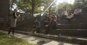 Students at SUNY Purchase sitting outside