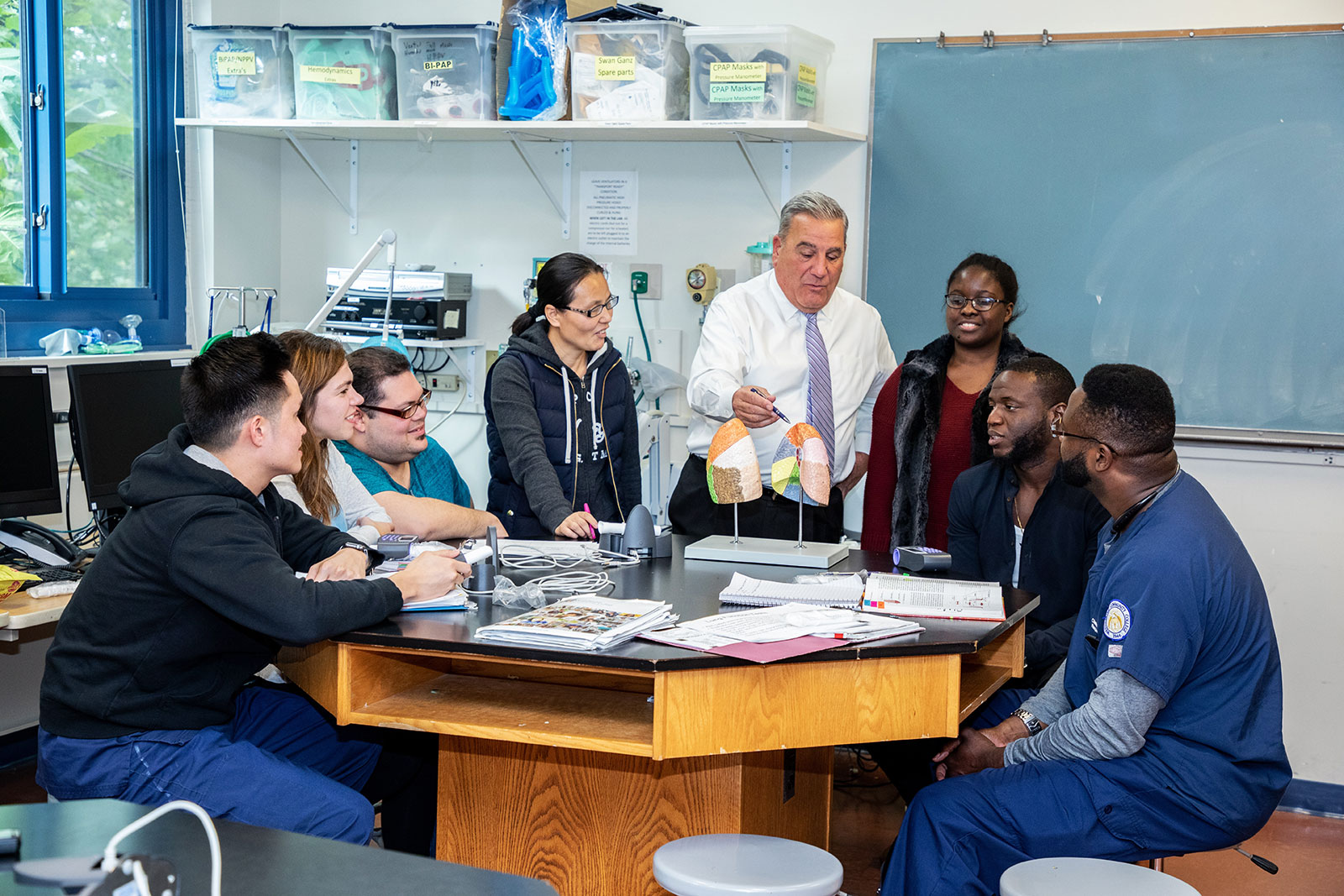 Professor Michael Petrone of Westchester Community College leads a class on pulmonary function testing in the respiratory lab.
