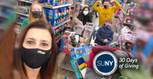 Group of people shop for toys with facemasks on.