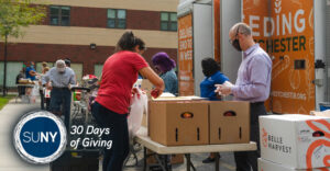 Tables for a mobile food pantry is set up outside at SUNY Purchase.