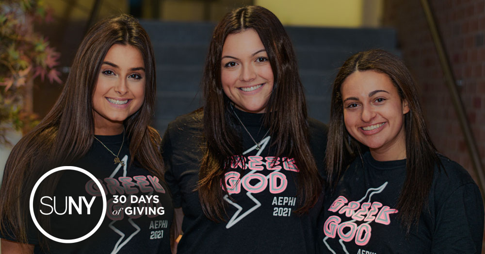 3 female college students wearing Greek God AEPHI 2021 tshirts.