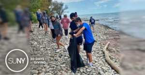 SUNY Oswego students cleanup the shore on Lake Ontario.