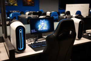 SUNY Canton Esports team room with Gaming chairs and computers.