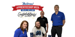 4 apprentices posing for a photo in front of a white background, text celebrating the success of national apprenticeship week.