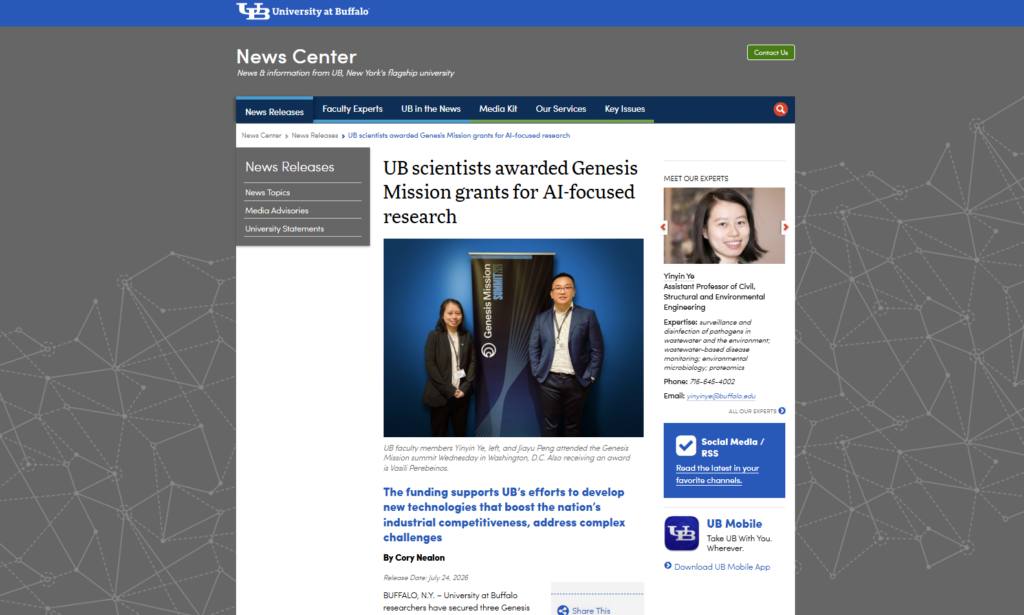 A screenshot of a University at Buffalo news article titled "UB scientists awarded Genesis Mission grants for AI-focused research." The featured image shows faculty members Yinyin Ye and Jiasu Peng standing next to a "Genesis Mission SUMMIT" banner.